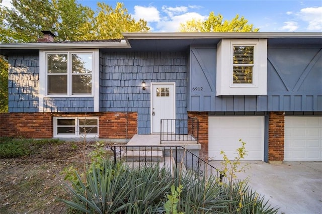 view of front of property with a garage