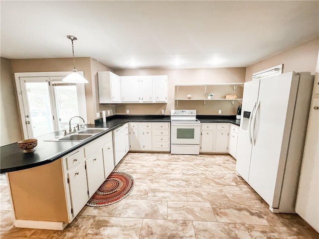 kitchen featuring white appliances, sink, decorative light fixtures, and white cabinets