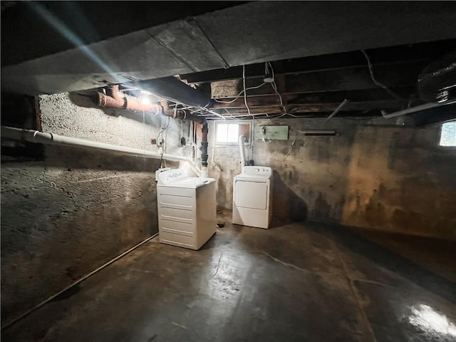 basement featuring separate washer and dryer