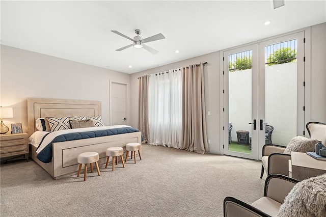 carpeted bedroom with ceiling fan, access to exterior, and french doors