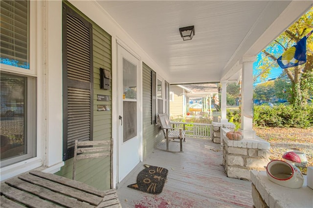 deck featuring a porch