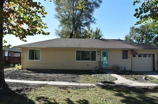 ranch-style home featuring a garage