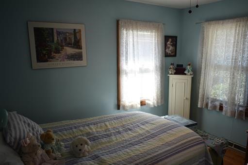 bedroom featuring hardwood / wood-style flooring