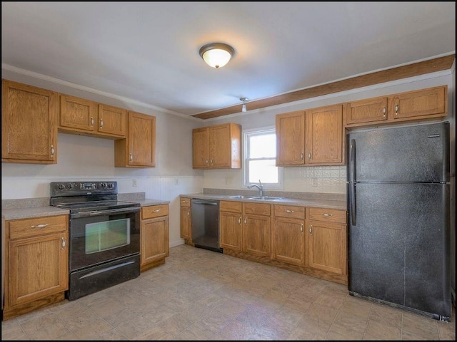 kitchen featuring sink and black appliances