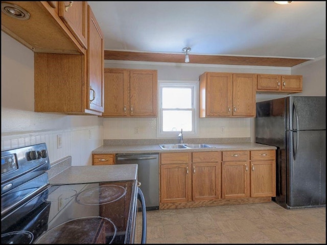 kitchen featuring sink and black appliances