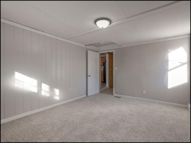 empty room featuring carpet floors