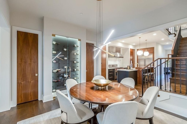 dining area featuring dark hardwood / wood-style floors