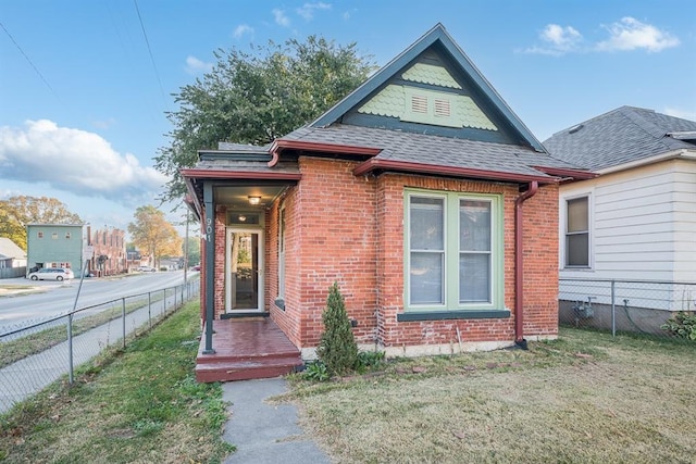 view of front of home with a front yard