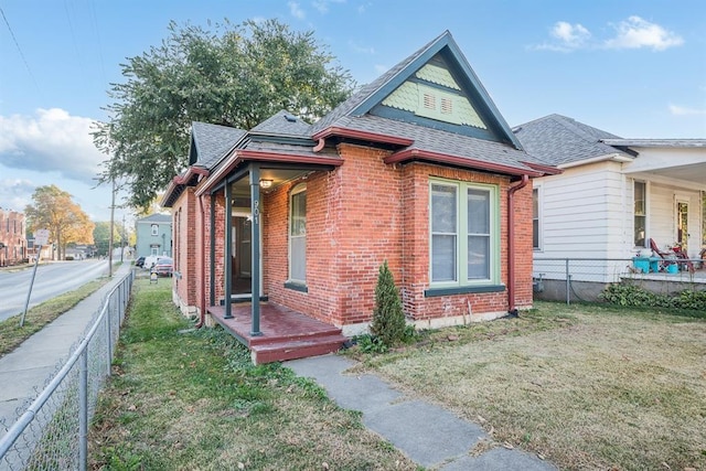 view of home's exterior with a yard