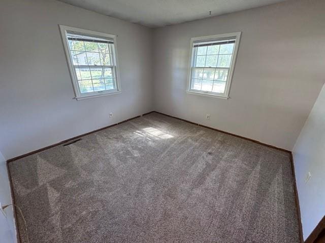 empty room featuring carpet