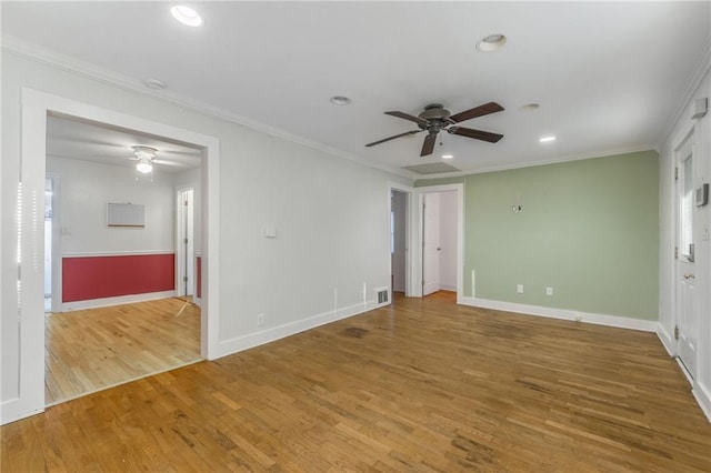 unfurnished bedroom featuring crown molding, wood-type flooring, and ceiling fan