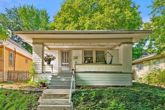 view of front of home featuring covered porch