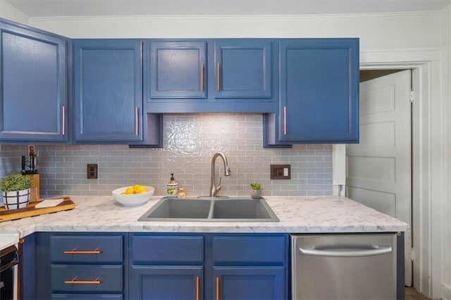 kitchen featuring blue cabinetry, dishwasher, tasteful backsplash, and sink