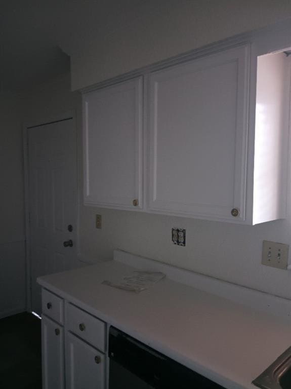 kitchen with white cabinets