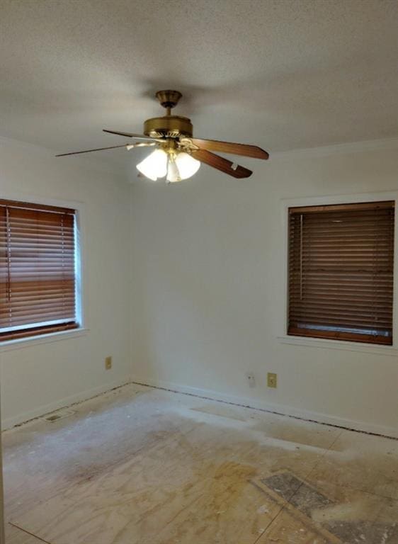 spare room with ceiling fan