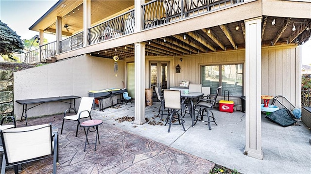 view of patio / terrace with a balcony