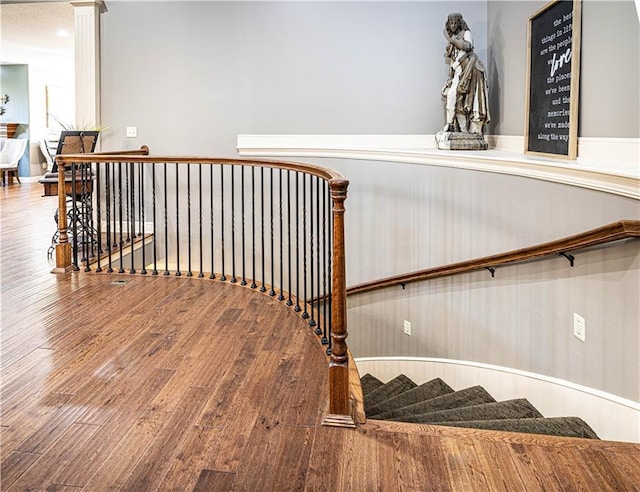 staircase featuring hardwood / wood-style floors