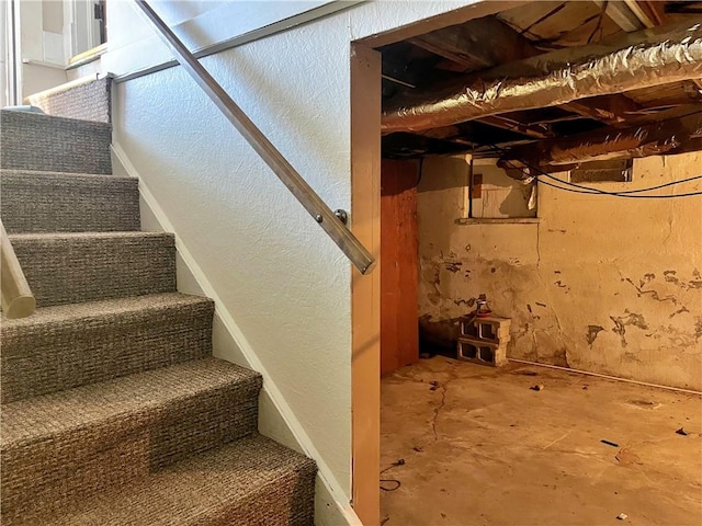 stairs with concrete floors