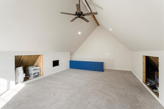 bonus room with carpet flooring, baseboards, a ceiling fan, and vaulted ceiling with beams