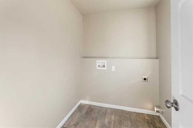 laundry area featuring baseboards, laundry area, hookup for a washing machine, wood finished floors, and electric dryer hookup