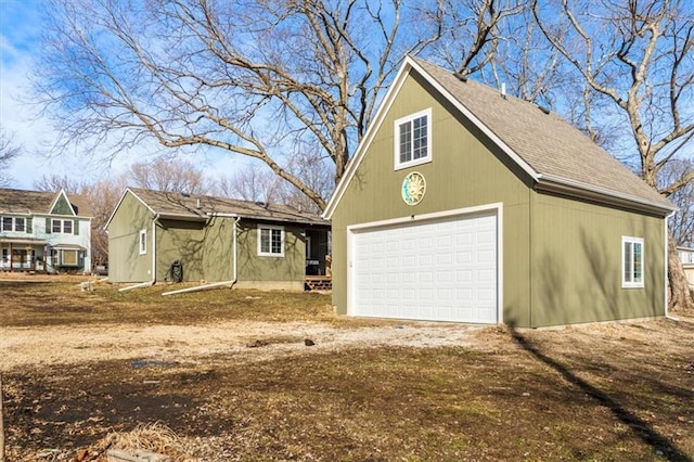 exterior space with a garage and driveway