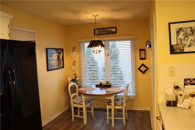 dining room featuring dark wood-type flooring