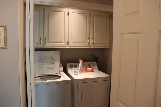5850 Park Cir, Shawnee, KS 66216 - laundry room with washer and dryer and cabinet space