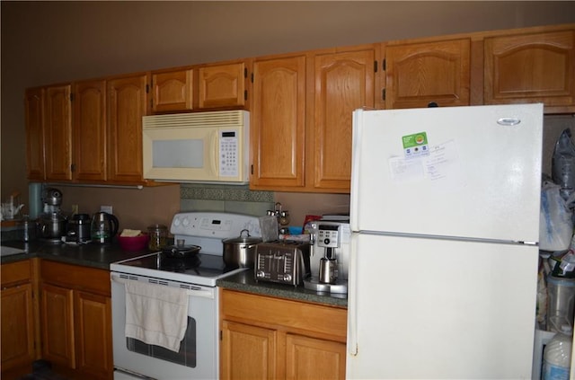 kitchen featuring white appliances