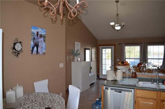 kitchen with sink, dishwasher, a notable chandelier, light brown cabinets, and dark hardwood / wood-style floors