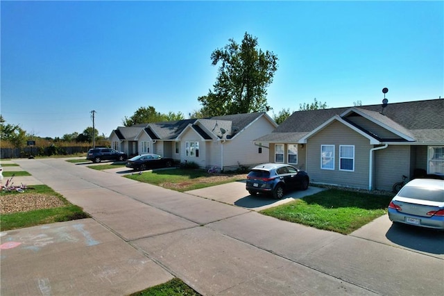 view of front of home with a front lawn