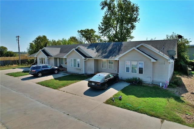 view of front of home with a front lawn