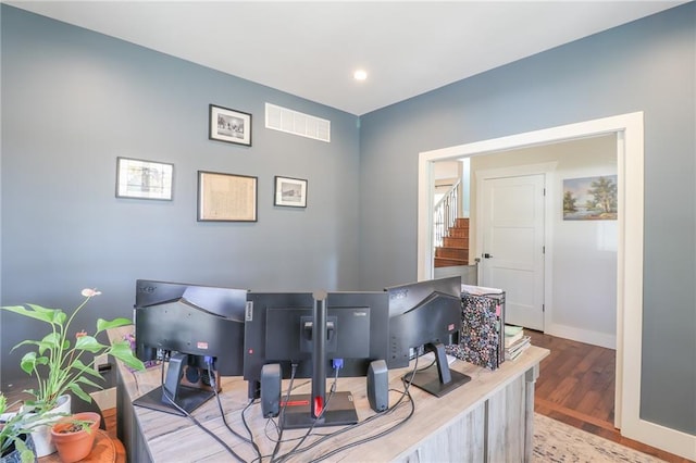 home office featuring hardwood / wood-style floors