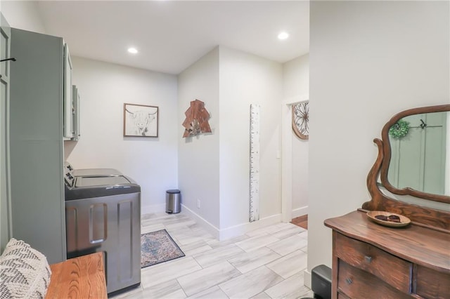 bathroom featuring independent washer and dryer