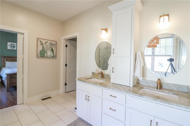 bathroom with vanity and hardwood / wood-style flooring