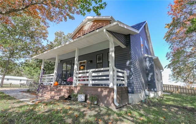 view of front of home featuring covered porch