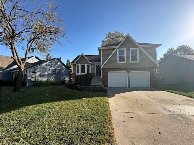 view of front of house featuring a front yard and a garage