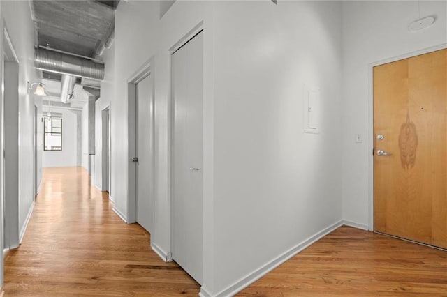 hallway featuring light wood-type flooring