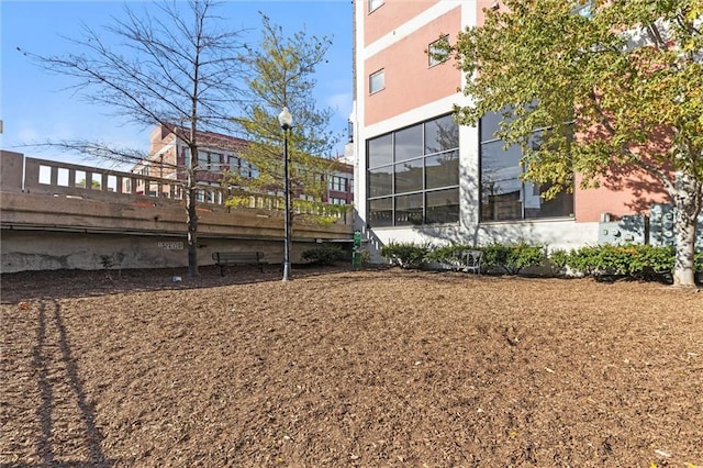 view of yard featuring a sunroom