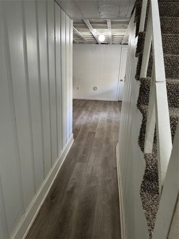 hallway featuring dark wood-type flooring