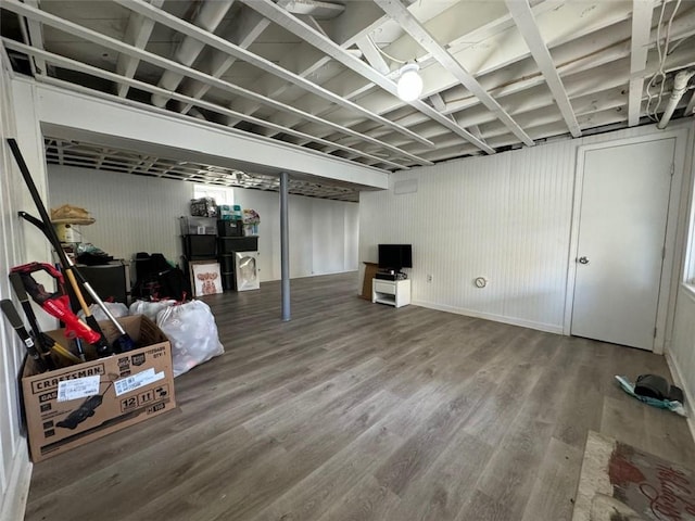 basement with wood-type flooring