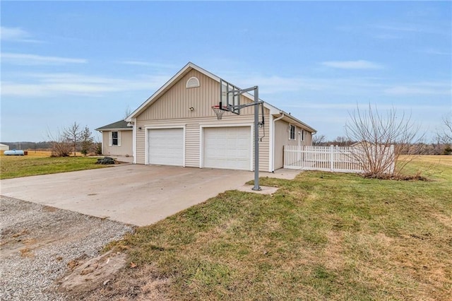 view of home's exterior featuring a yard and basketball court