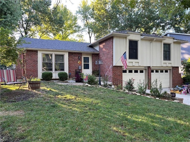 split level home with a front lawn and a garage