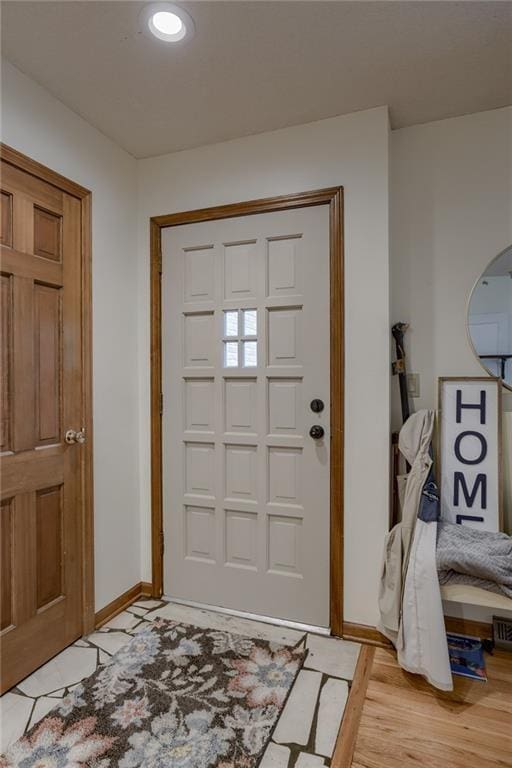 320 Jones Ave, Warrensburg, MO 64093 - foyer featuring baseboards and light wood-type flooring