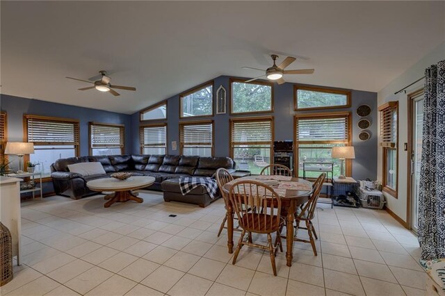 320 Jones Ave, Warrensburg, MO 64093 - dining space with a ceiling fan, lofted ceiling, and light tile patterned floors