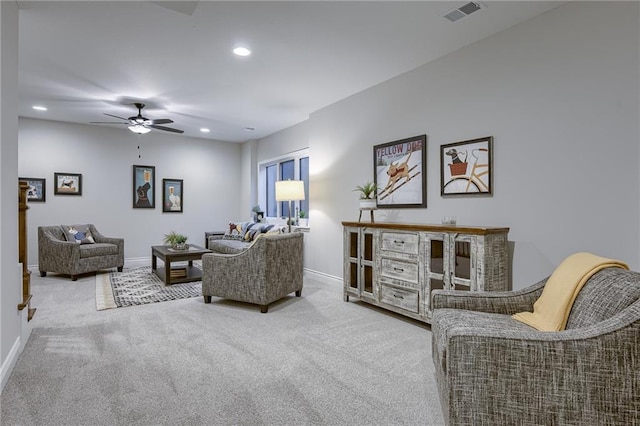 living area with recessed lighting, a ceiling fan, visible vents, baseboards, and carpet floors