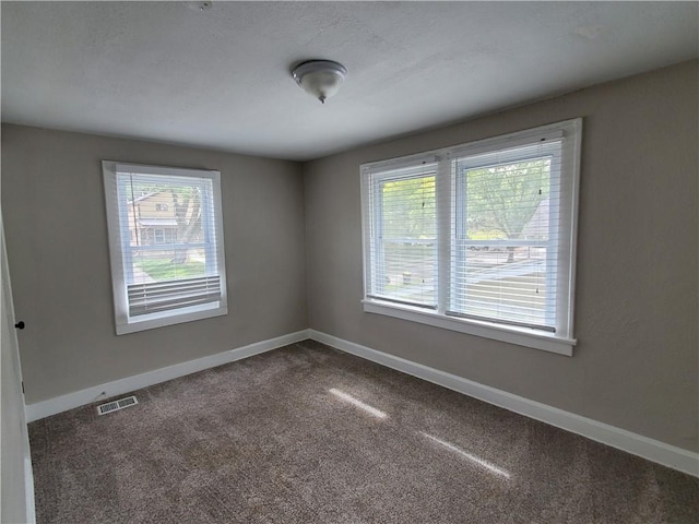 view of carpeted spare room