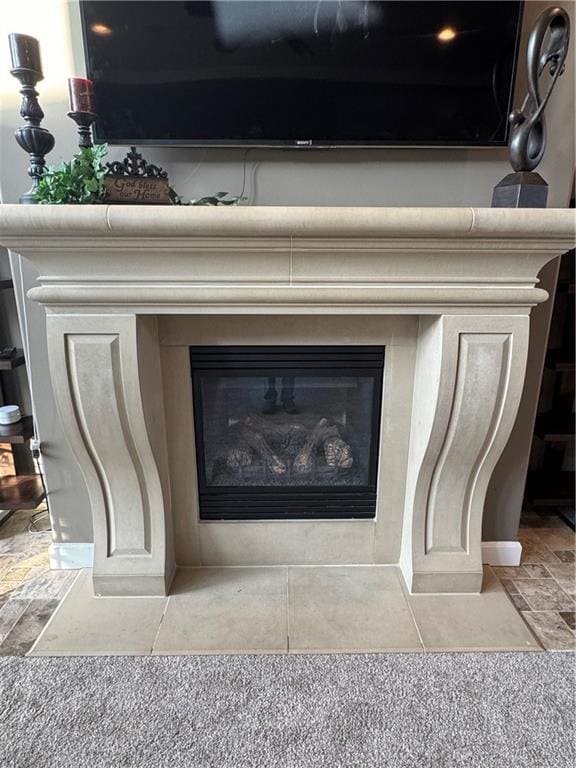 room details with a tiled fireplace