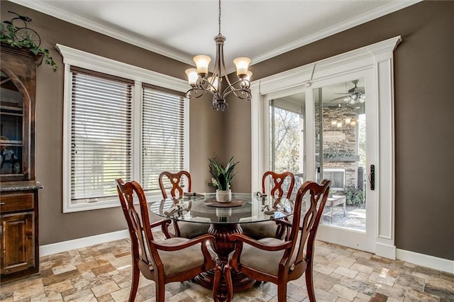 dining room with a chandelier and ornamental molding