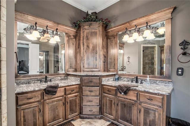 bathroom with vanity and ornamental molding