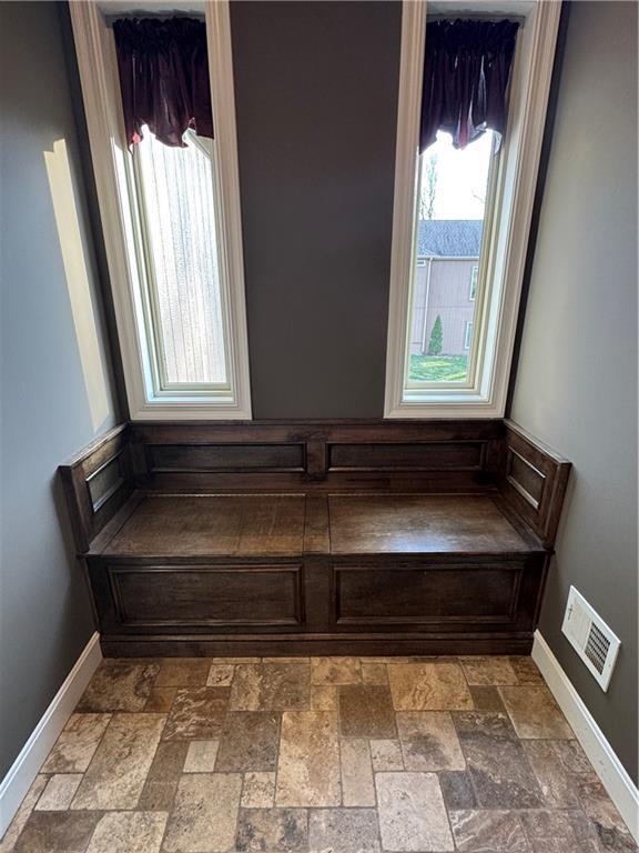 interior details featuring visible vents and baseboards